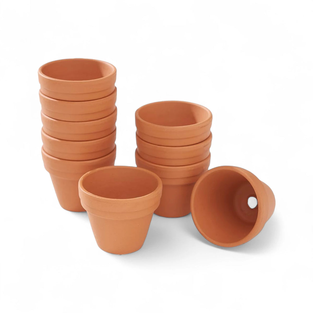 Terracotta pot on white background, product photo 2.
